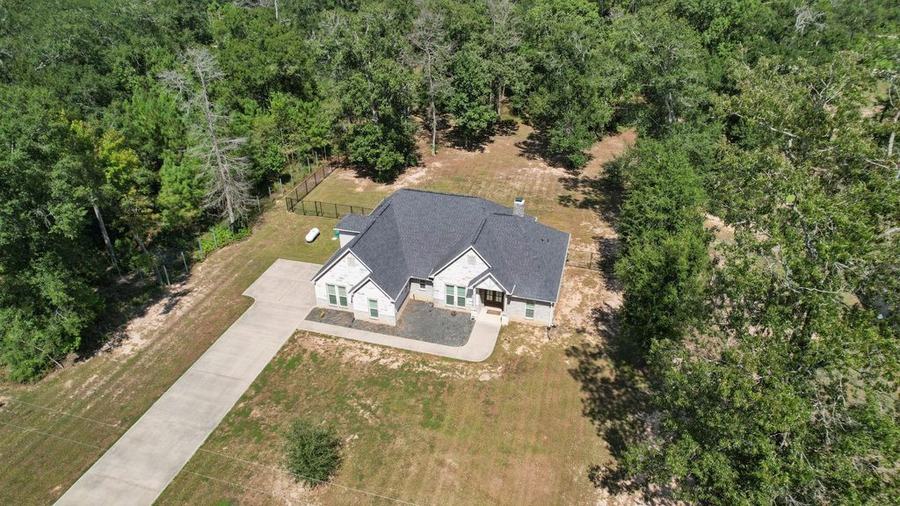 Aerial view of 7815 Timber Switch Rd and the surrounding neighborhood