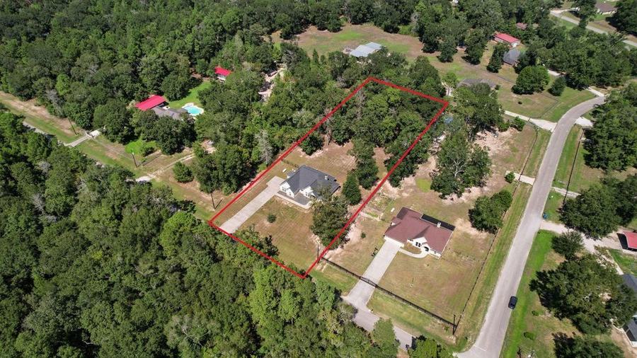 Aerial view of 7815 Timber Switch Rd and the surrounding neighborhood