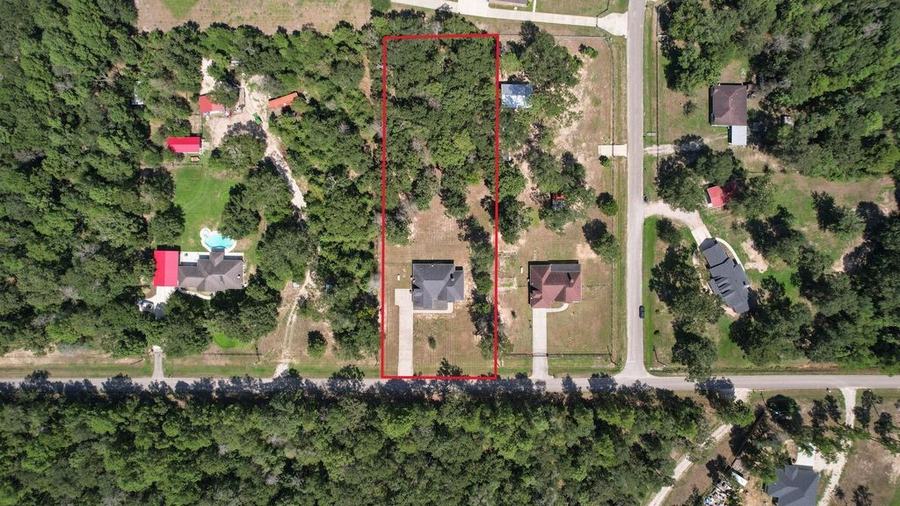 Aerial view of 7815 Timber Switch Rd and the surrounding neighborhood
